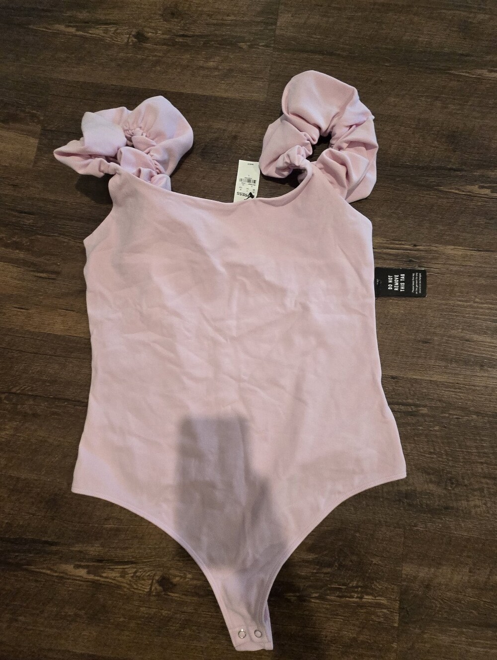 Express Pink One-Piece Bodysuit with Ruffle Shoulders